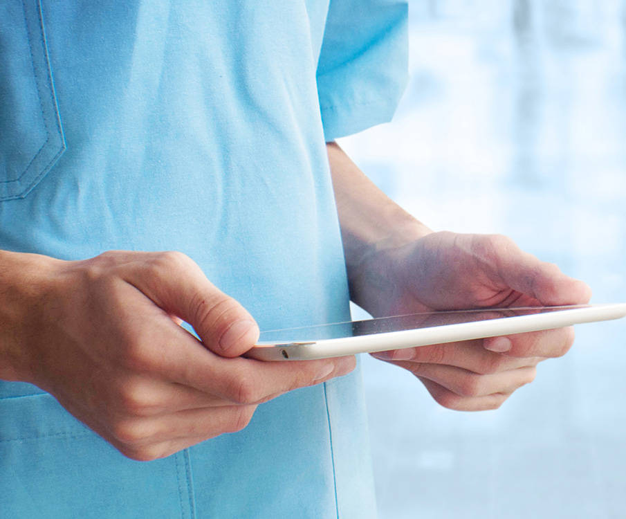 Doctor watching laptop